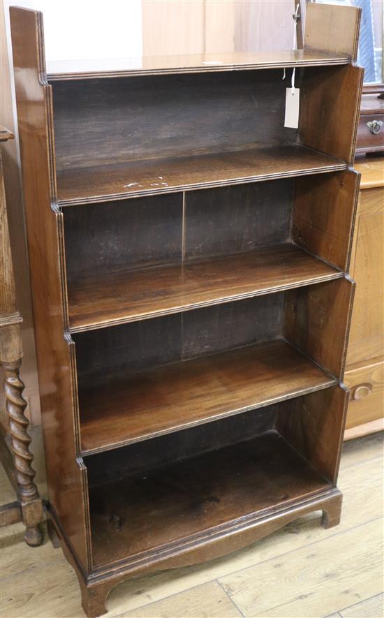 A mahogany four-tier waterfall bookcase, W 24in approx and a Georgian mahogany toilet mirror (2)